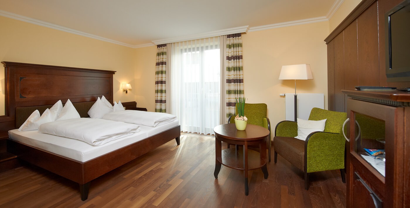 Hotelzimmer mit Holzboden